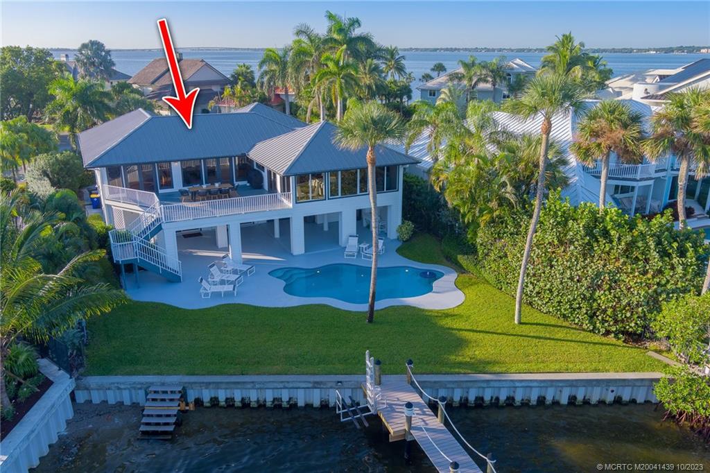 4283 Northeast Joes Point Road Stuart, FL 34996 - Photo 54 of 60 an aerial view of a house