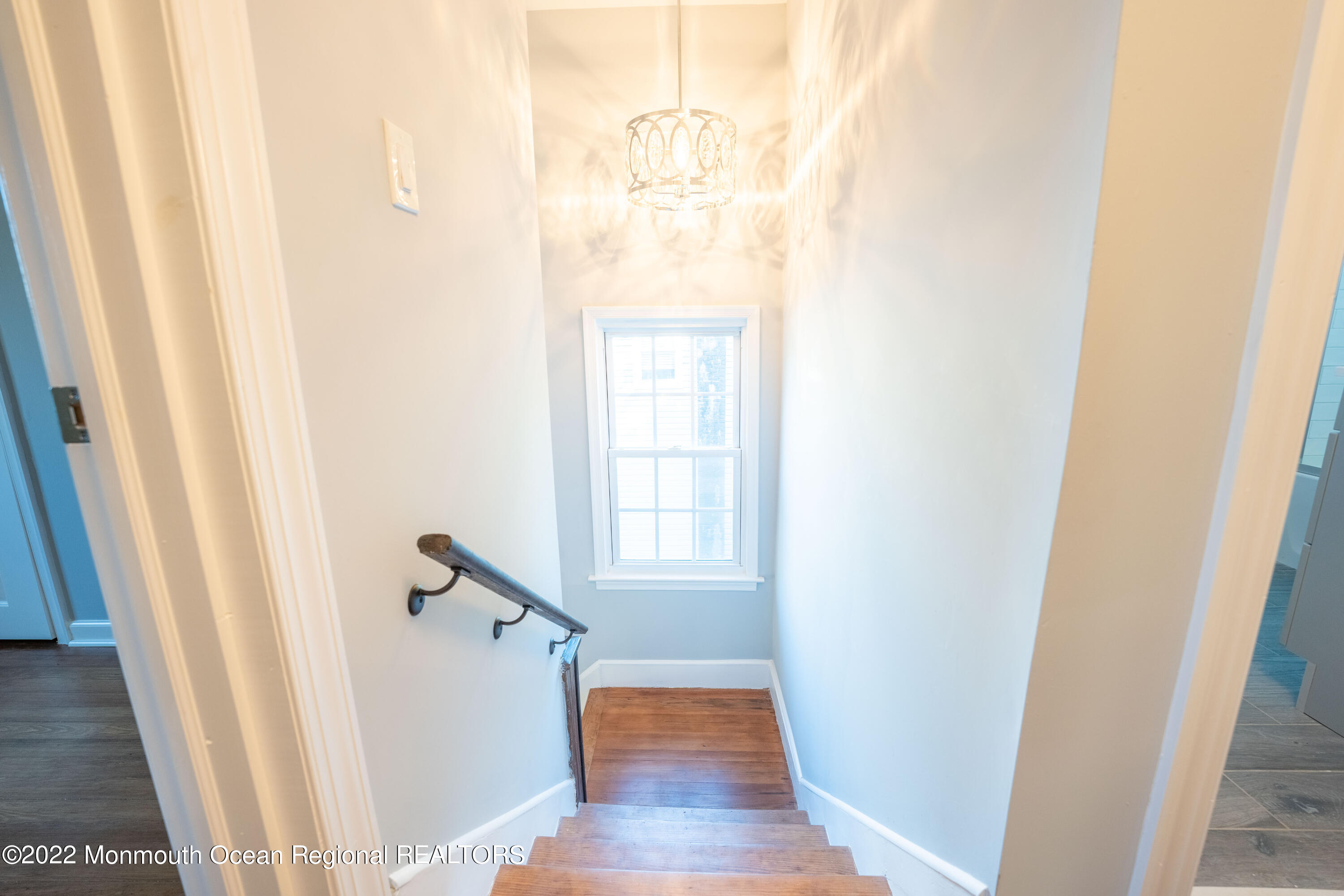 397 E Road Belford, NJ 07718 - Photo 17 of 34 a view of entryway with wooden floor