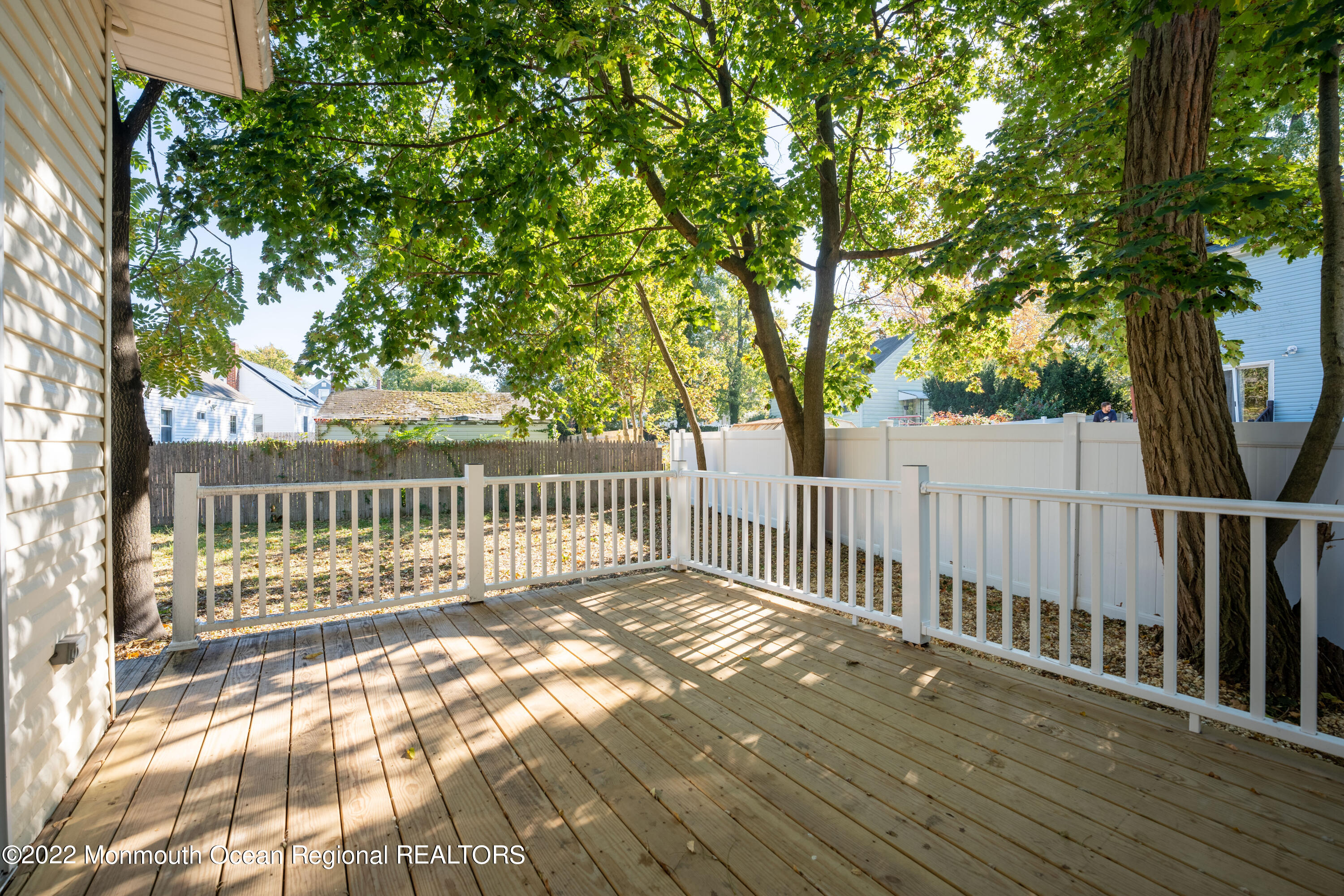 397 E Road Belford, NJ 07718 - Photo 29 of 34 a view of a house with a deck