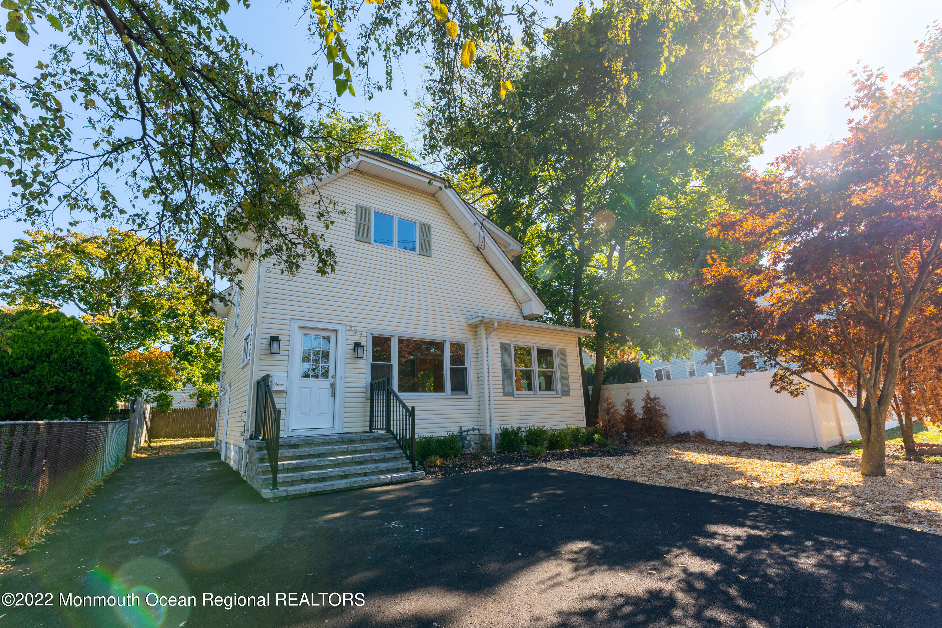 397 E Road Belford, NJ 07718 - Photo 3 of 34 a view of a house with a yard