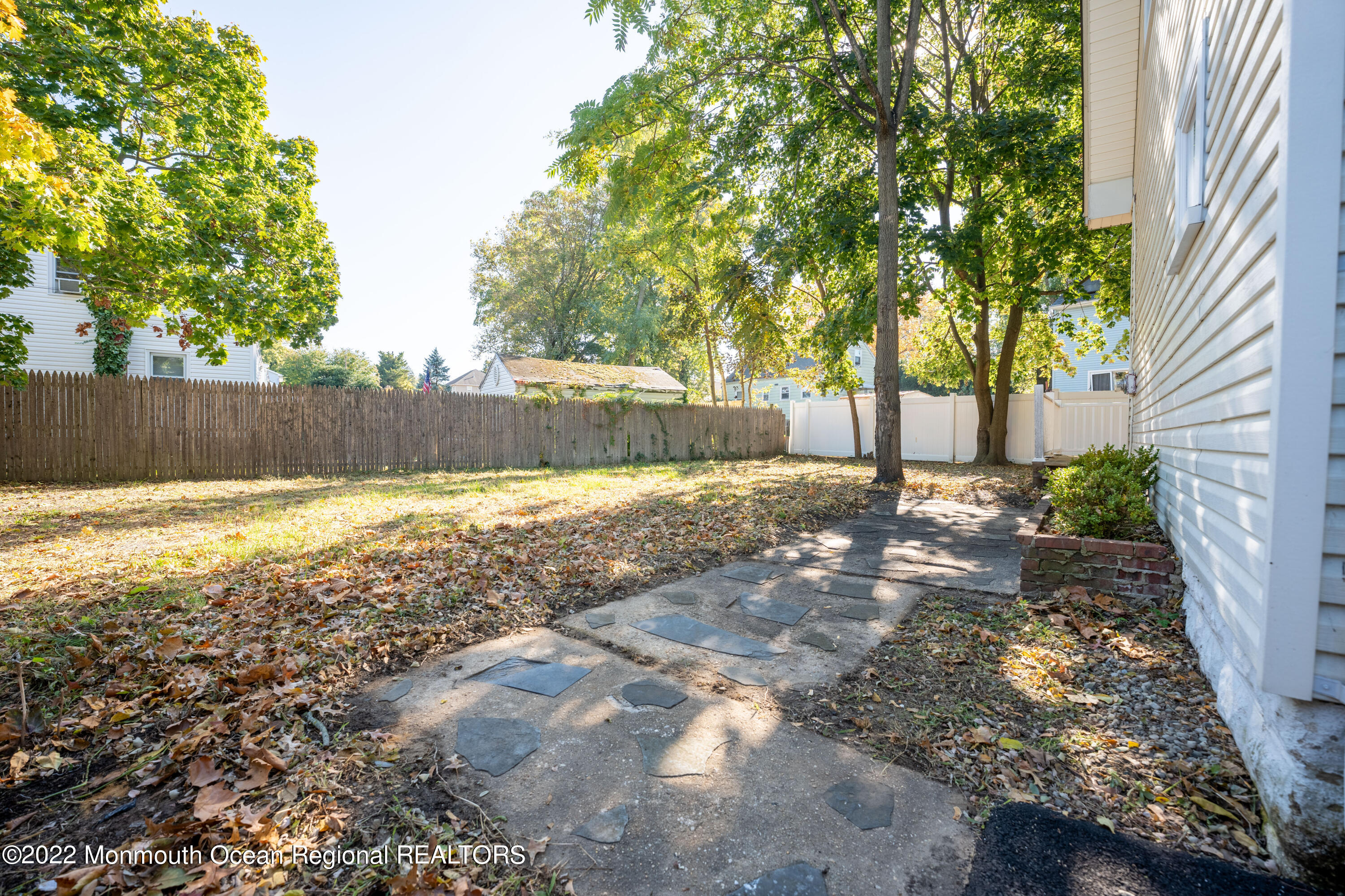 397 E Road Belford, NJ 07718 - Photo 31 of 34 a view of a yard with trees