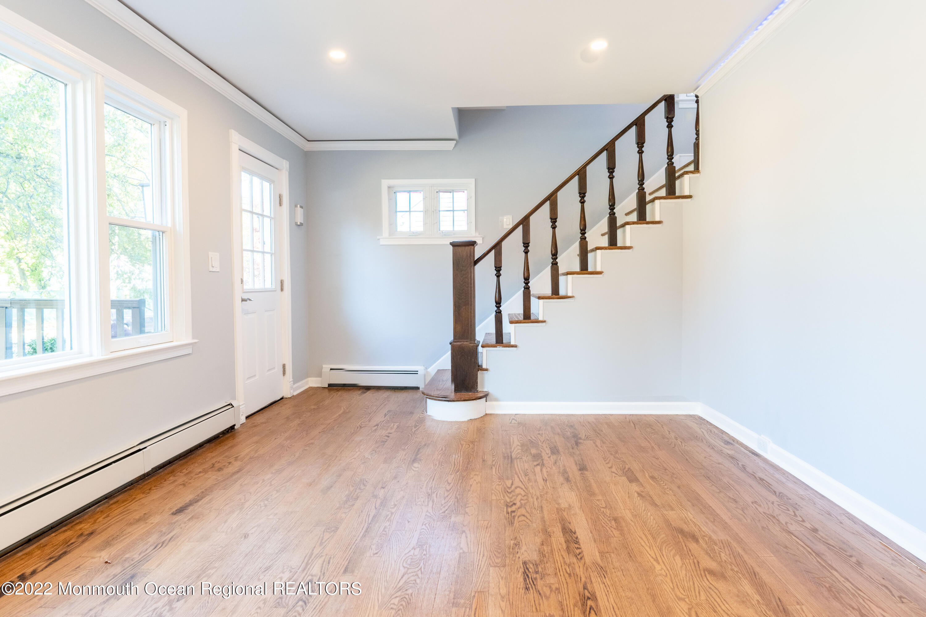 397 E Road Belford, NJ 07718 - Photo 6 of 34 a view of empty room with wooden floor and fan