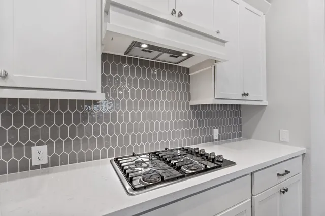 a kitchen with a stove