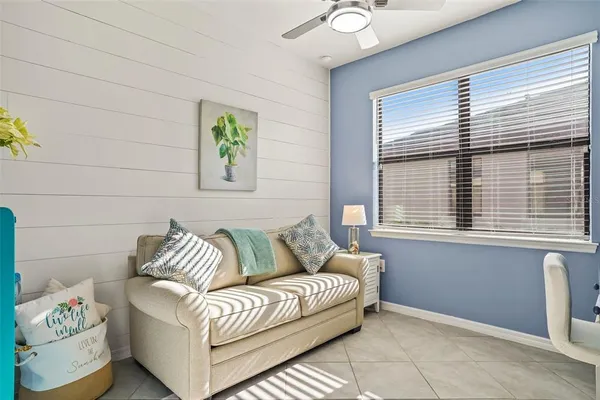 a living room with furniture and a window