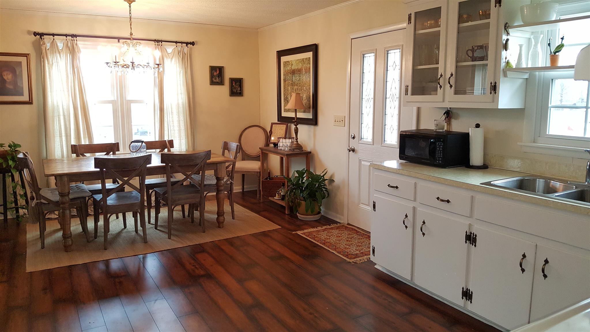 1445 Summitville Road Manchester, TN 37355 - Photo 14 of 22 a view of a a dining room with furniture window and wooden floor