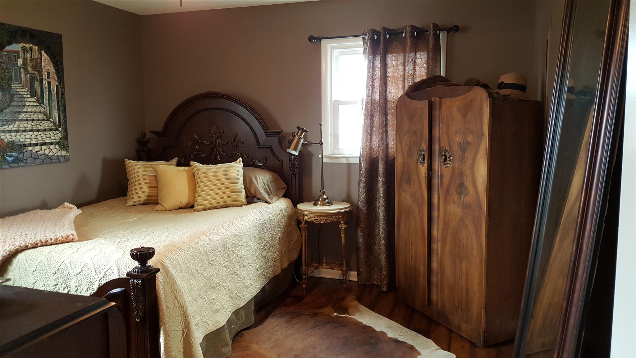 1445 Summitville Road Manchester, TN 37355 - Photo 17 of 22 a bedroom with a bed and a dresser