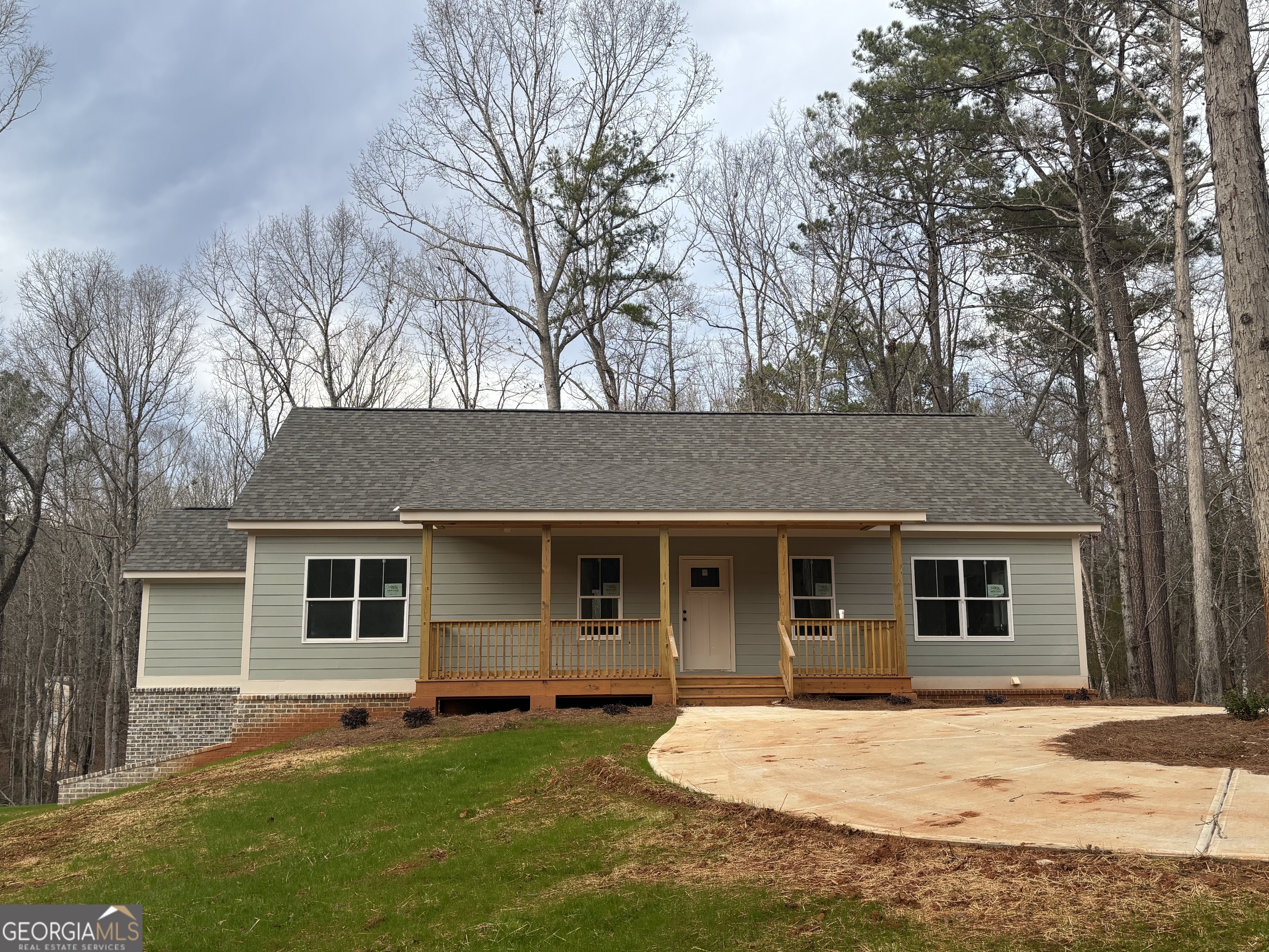 front view of a house with a yard
