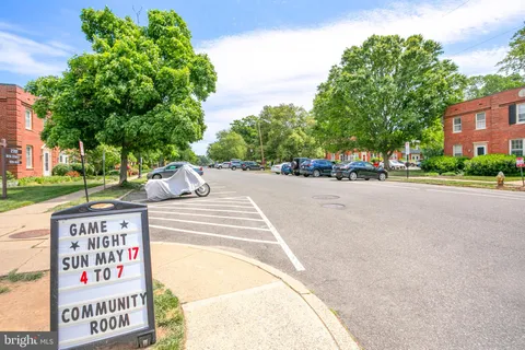 a park view with street sign board