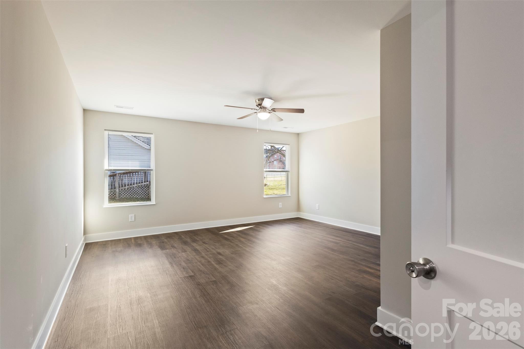316 Union Street Maiden, NC 28650 - Photo 13 of 21 wooden floor in an empty room with a window