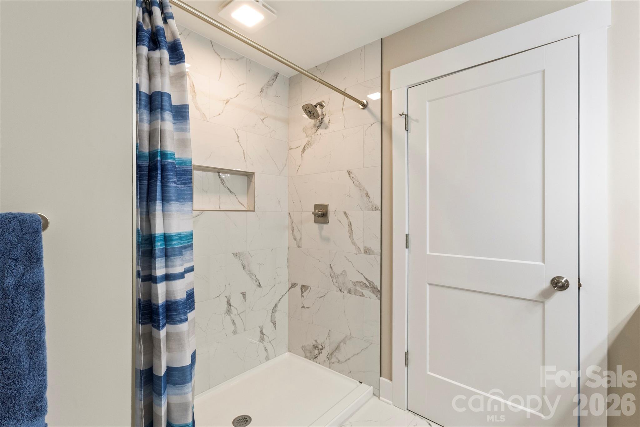 316 Union Street Maiden, NC 28650 - Photo 19 of 21 a bathroom with a shower and toilet