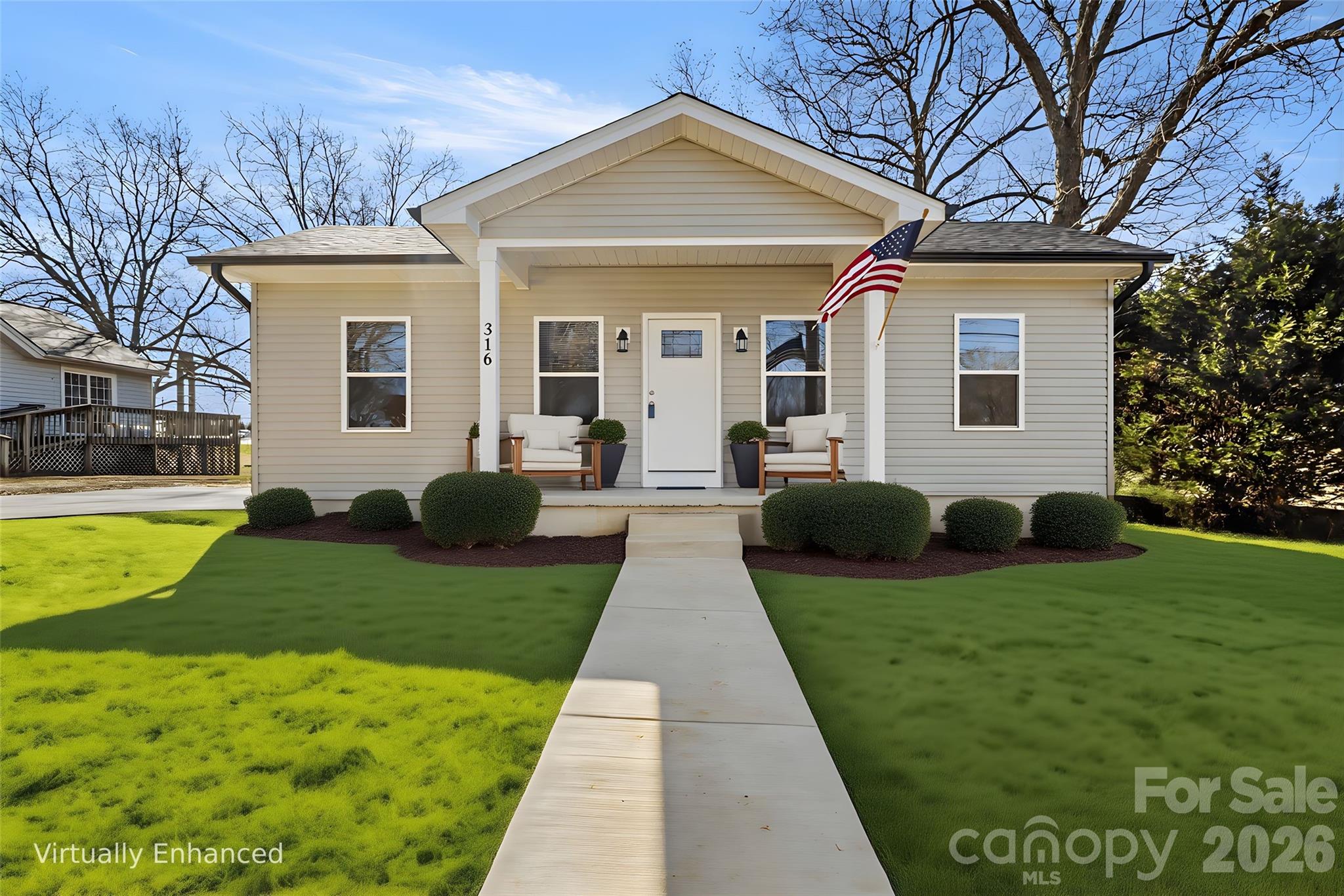 316 Union Street Maiden, NC 28650 - Photo 2 of 23 a front view of a house with garden