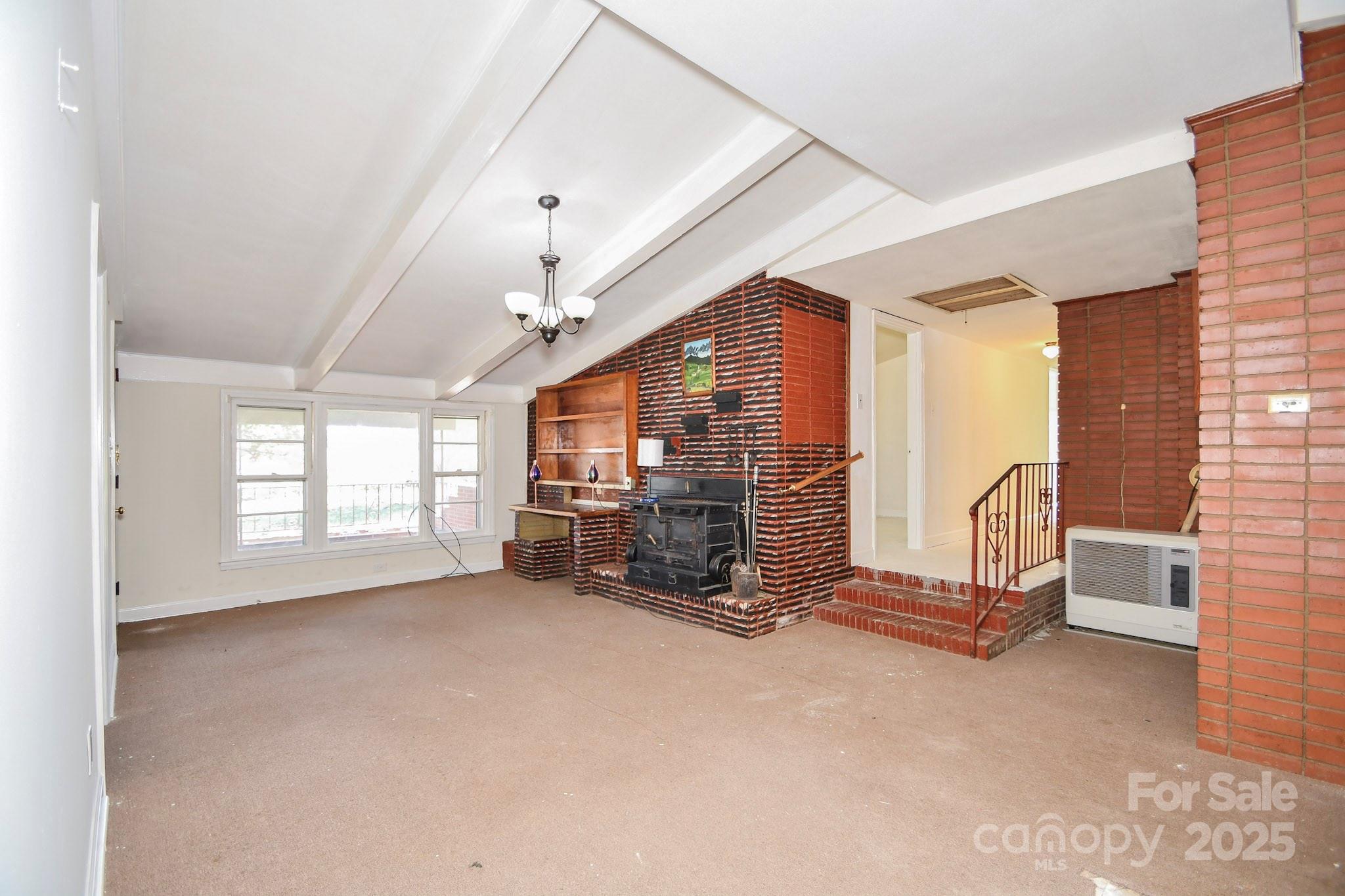 2922 Joe Griffin Road Monroe, NC 28112 - Photo 12 of 26 a view of a livingroom with furniture and a window