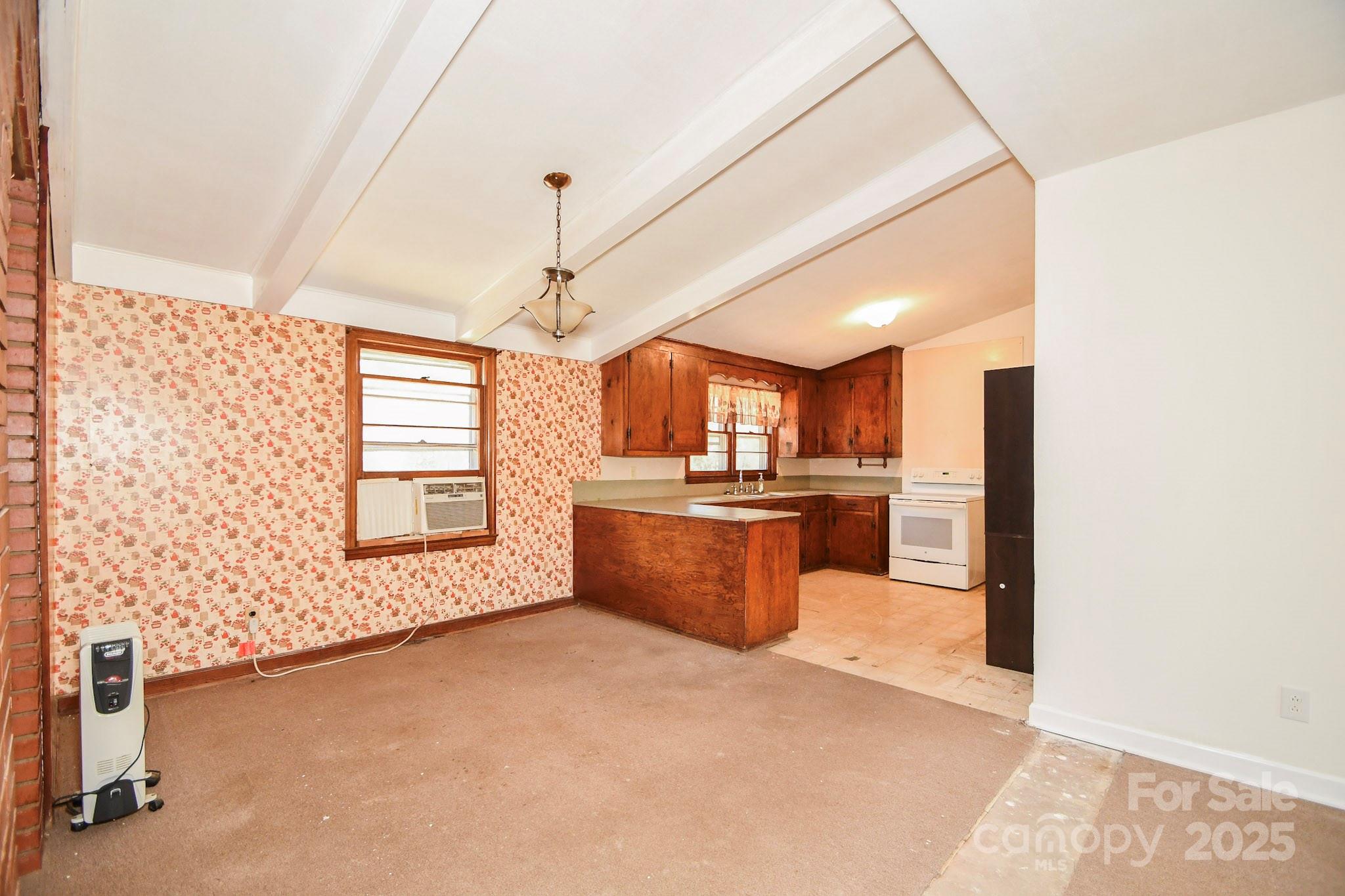2922 Joe Griffin Road Monroe, NC 28112 - Photo 17 of 26 a view of a kitchen with a stove
