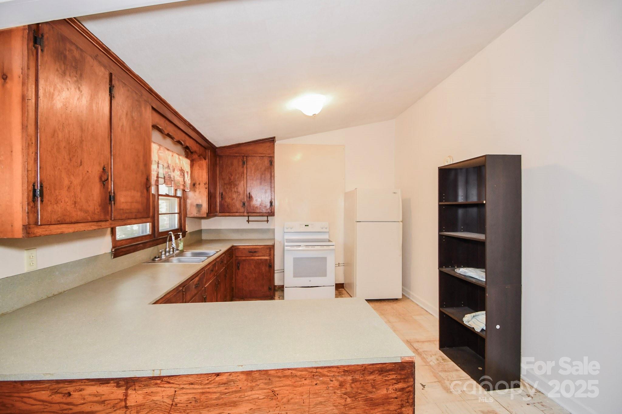2922 Joe Griffin Road Monroe, NC 28112 - Photo 18 of 26 a view of a kitchen cabinets and a kitchen counter top space