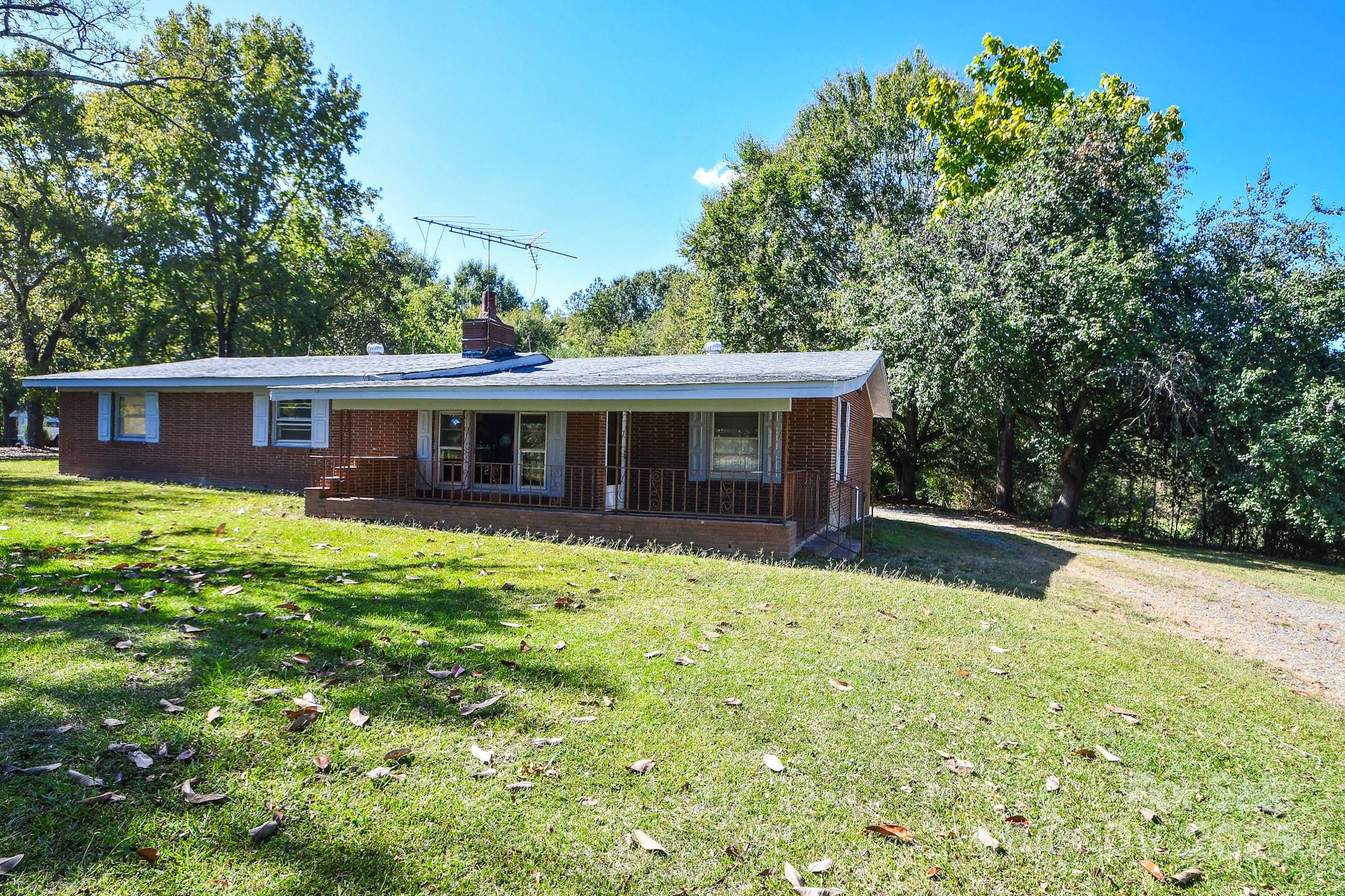 2922 Joe Griffin Road Monroe, NC 28112 - Photo 2 of 26 a front view of house with yard and green space