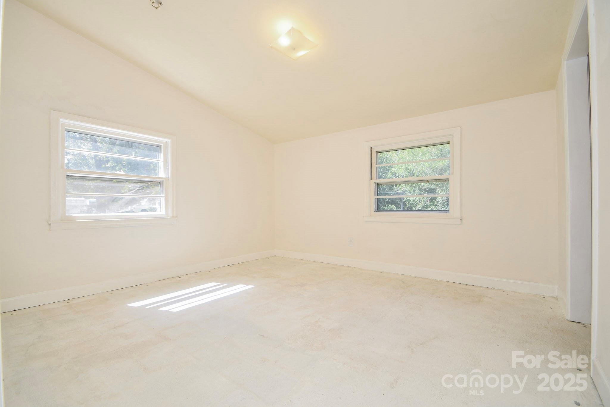 2922 Joe Griffin Road Monroe, NC 28112 - Photo 25 of 26 an empty room with a window