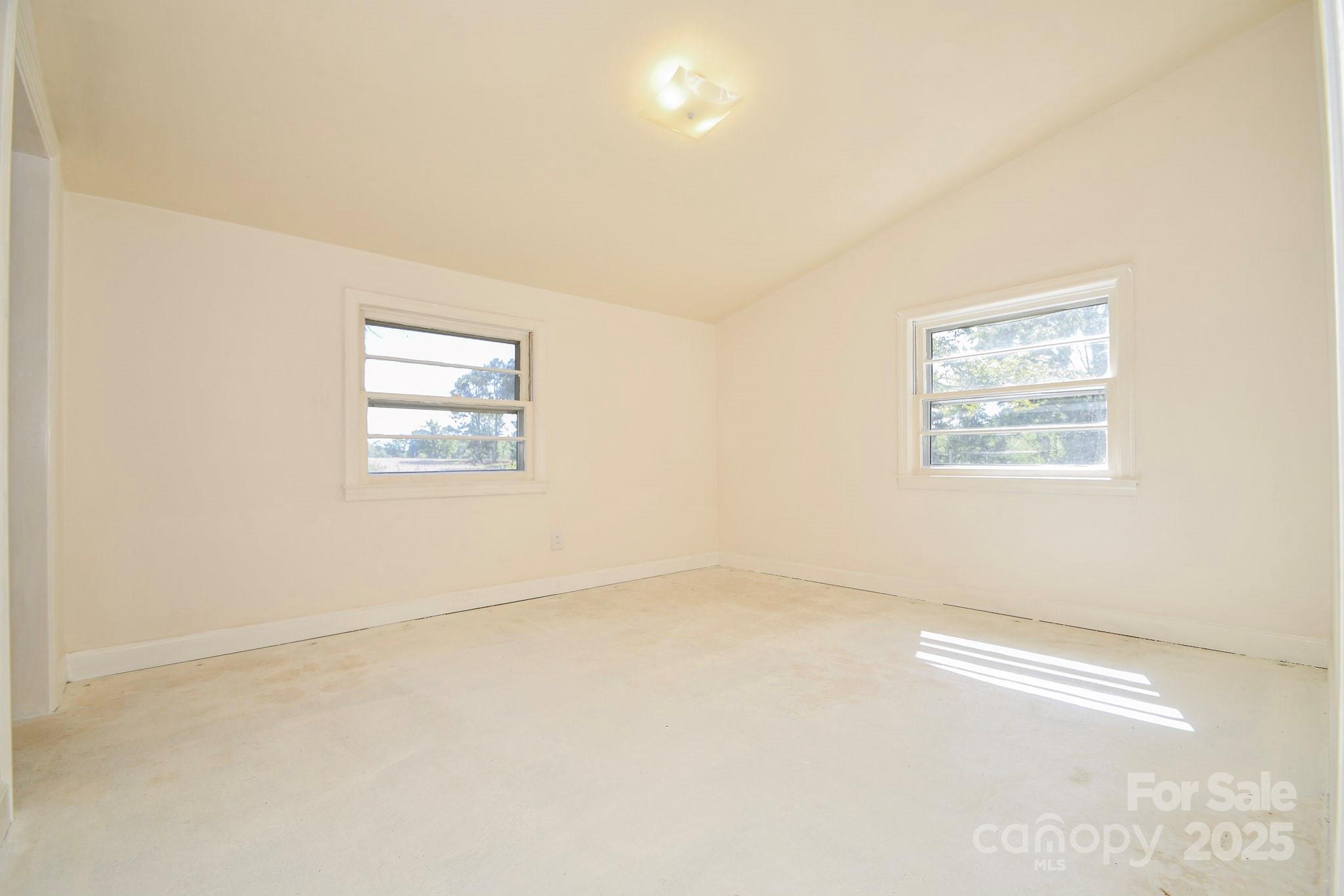 2922 Joe Griffin Road Monroe, NC 28112 - Photo 26 of 26 an empty room with windows