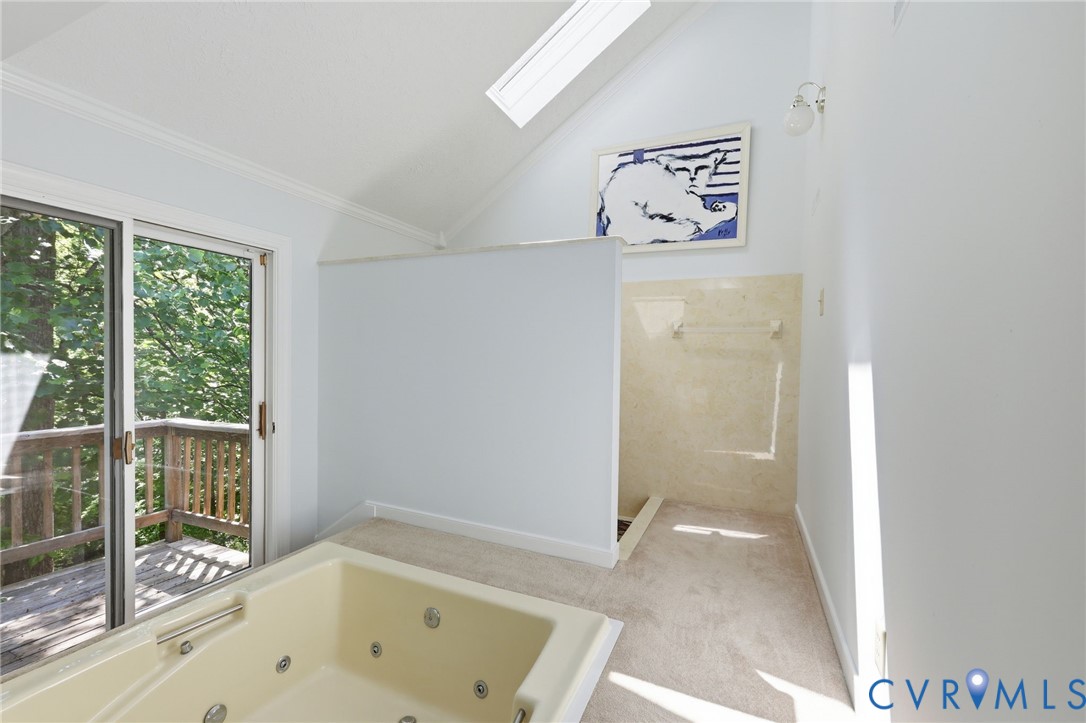 3201 East Brigstock Road Midlothian, VA 23113 - Photo 49 of 72 a bathroom with a bathtub and a shower