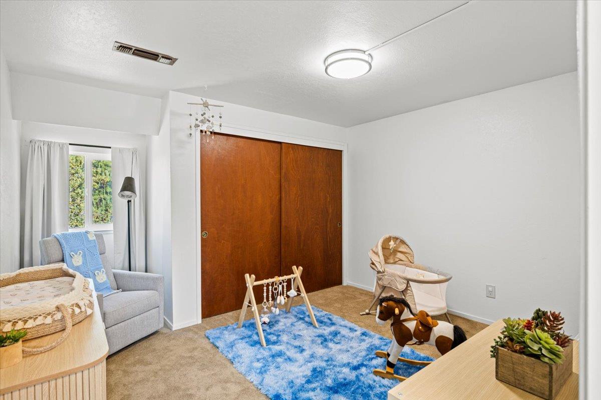 10402 Newtown Road Nevada City, CA 95959 - Photo 20 of 44 a living room with furniture and a window