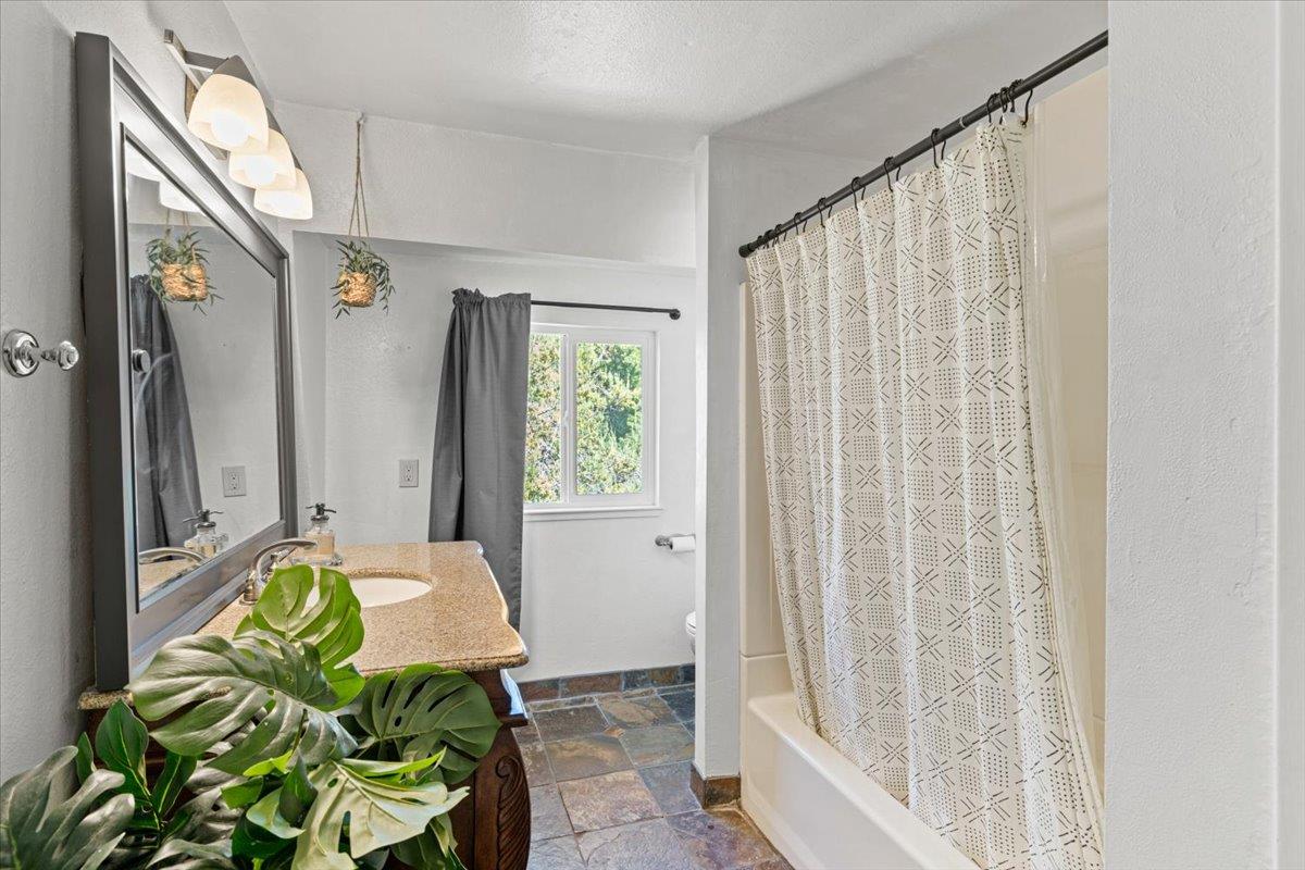 10402 Newtown Road Nevada City, CA 95959 - Photo 24 of 44 a living room with furniture and a window