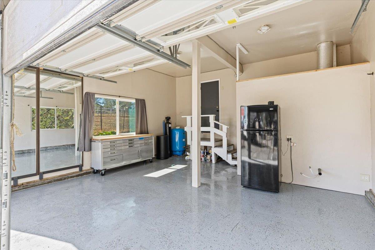 10402 Newtown Road Nevada City, CA 95959 - Photo 28 of 44 a view of a livingroom with furniture and a window