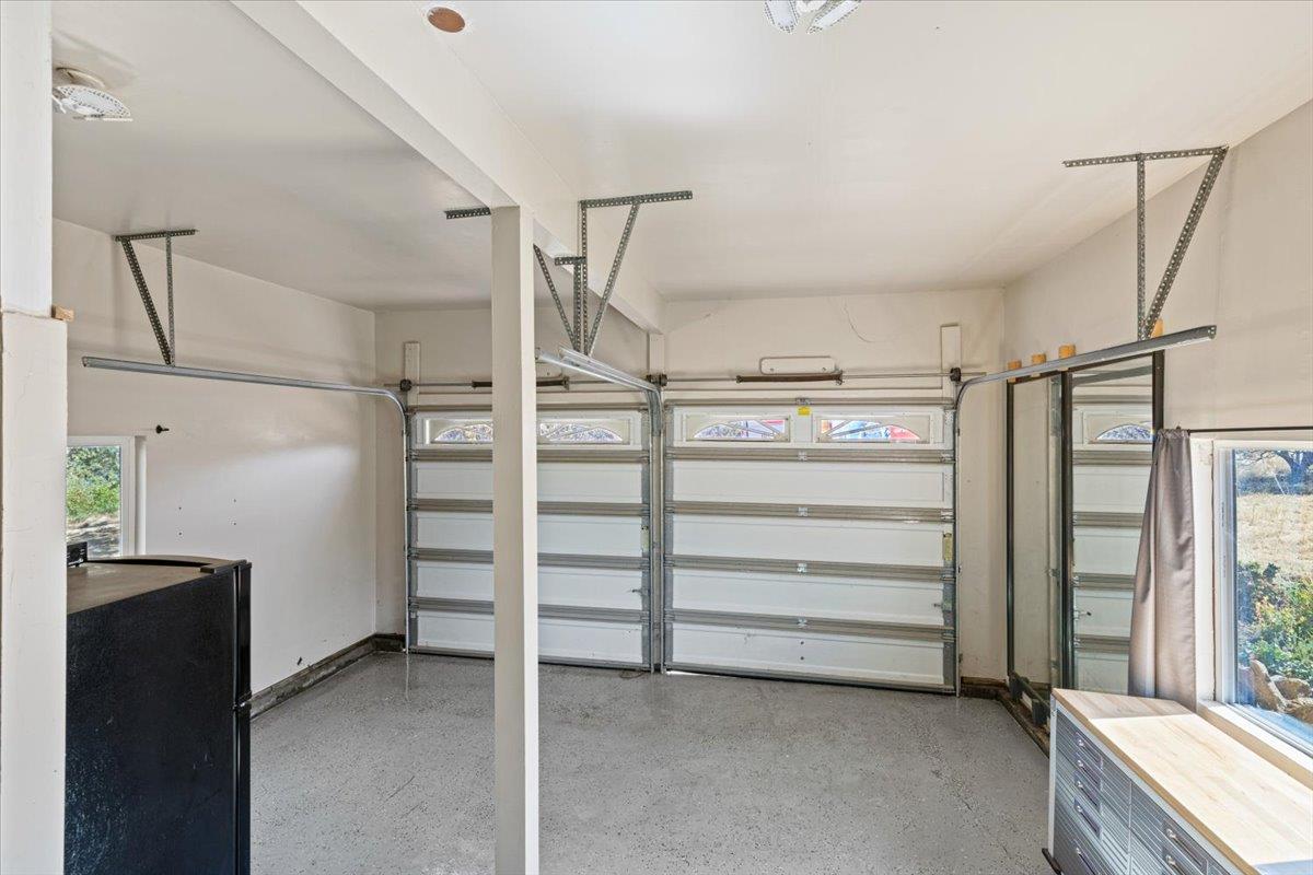 10402 Newtown Road Nevada City, CA 95959 - Photo 30 of 44 a view of walk in closet with clothes and shoes