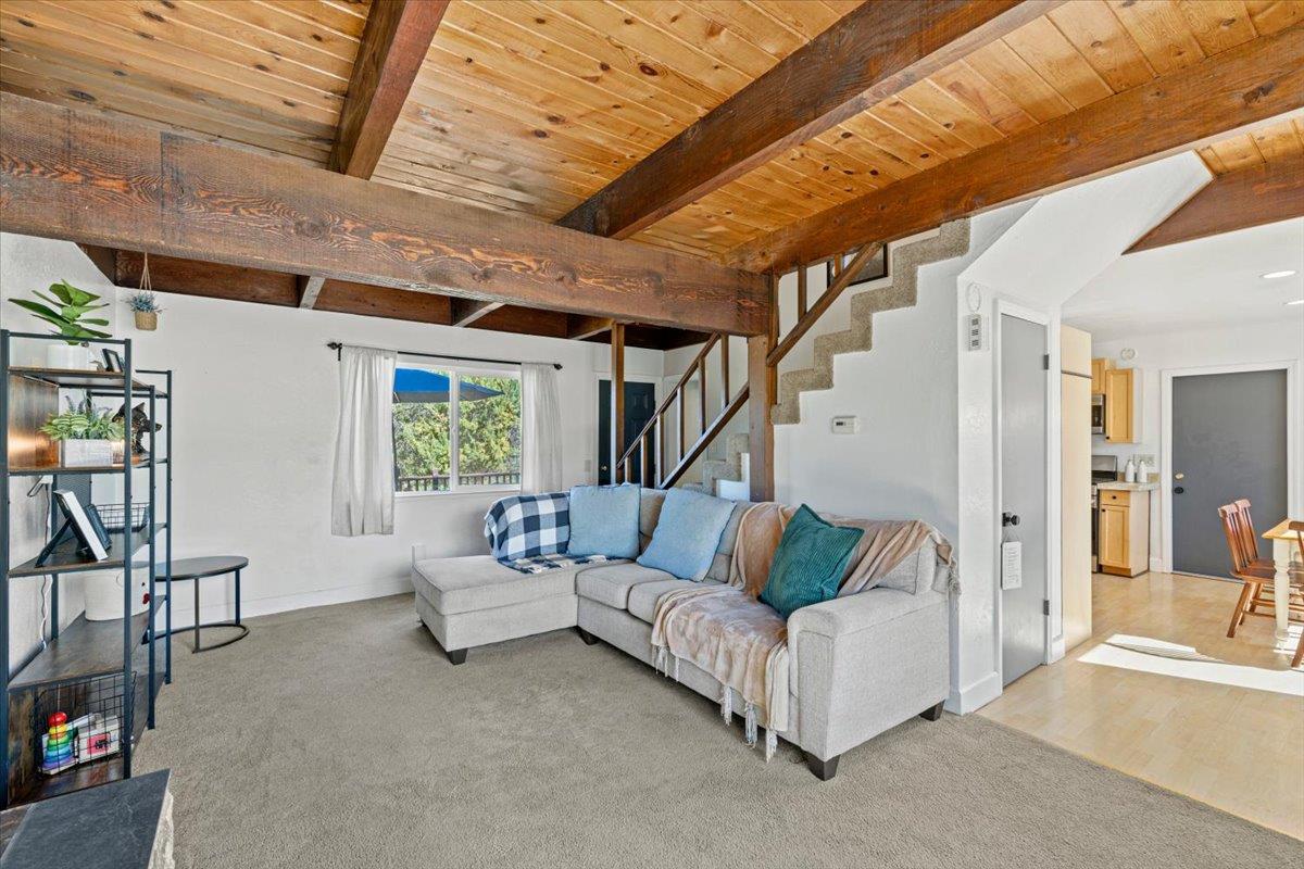 10402 Newtown Road Nevada City, CA 95959 - Photo 9 of 44 a living room with furniture and a chandelier