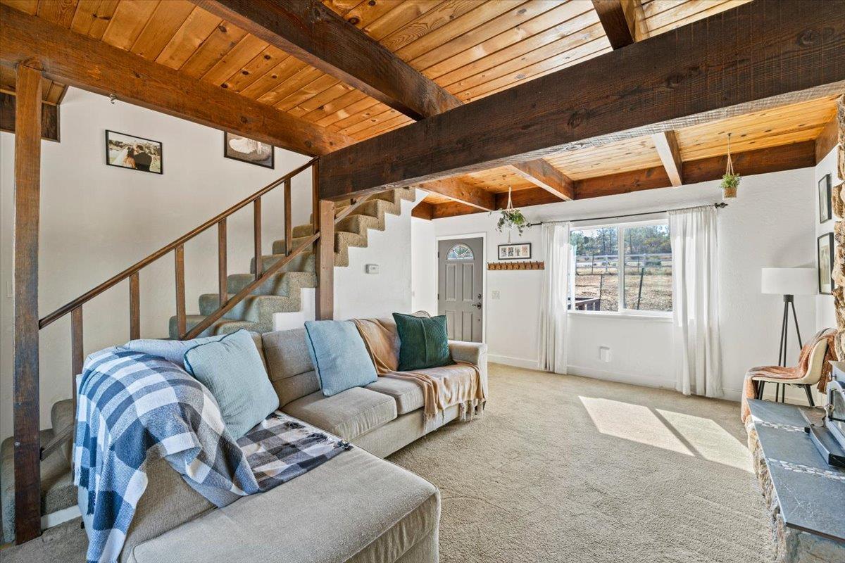 10402 Newtown Road Nevada City, CA 95959 - Photo 10 of 44 a living room with furniture and a window