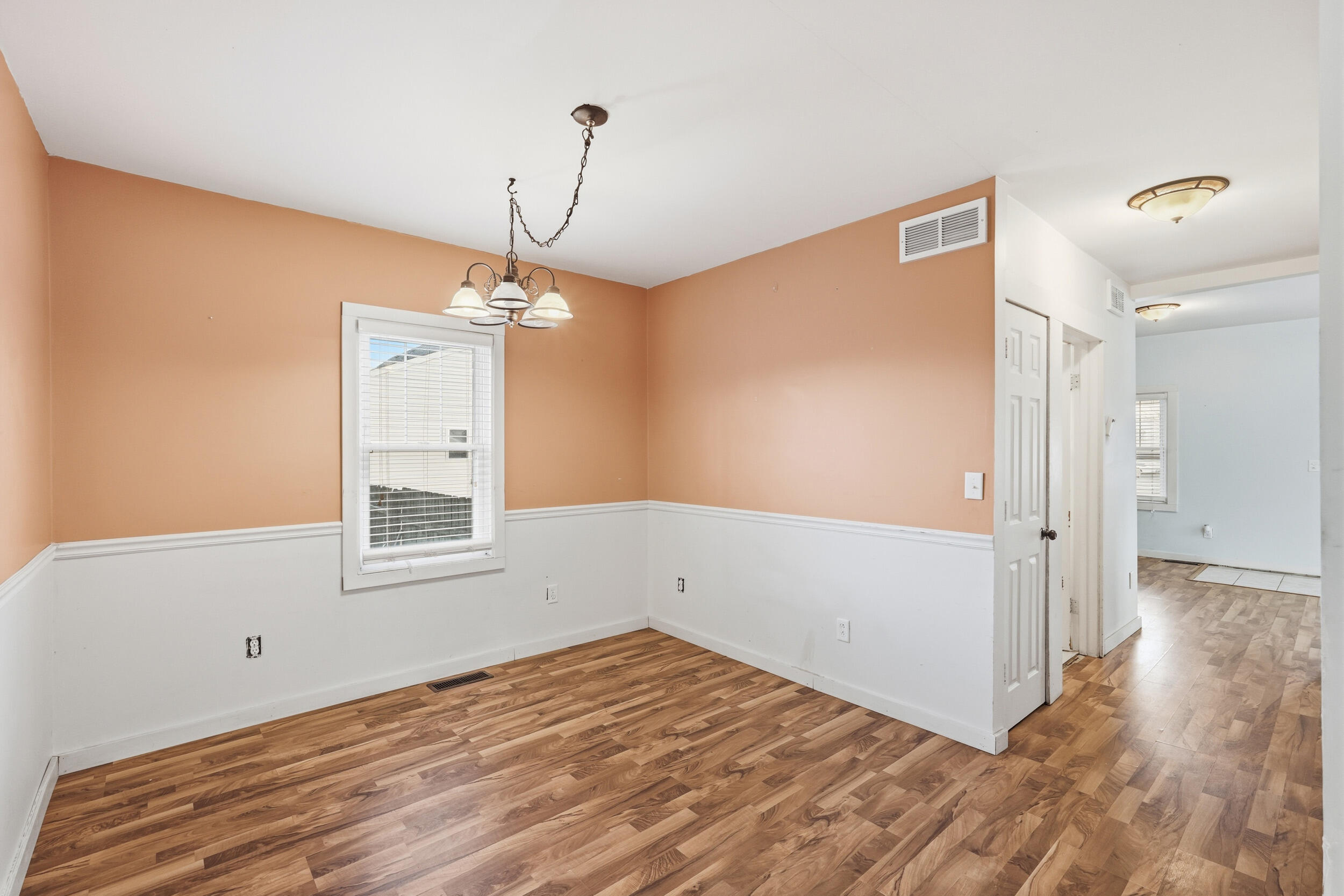 122 9th Street Southwest De Motte, IN 46310 - Photo 12 of 29 a view of empty room with wooden floor and fan