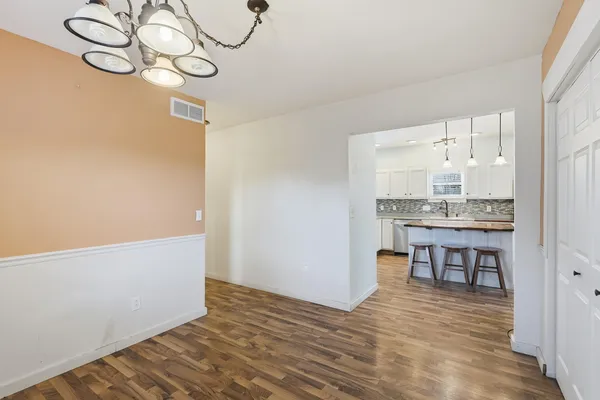 a view of a room with breakfast area
