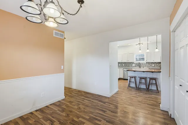 a view of a room with breakfast area