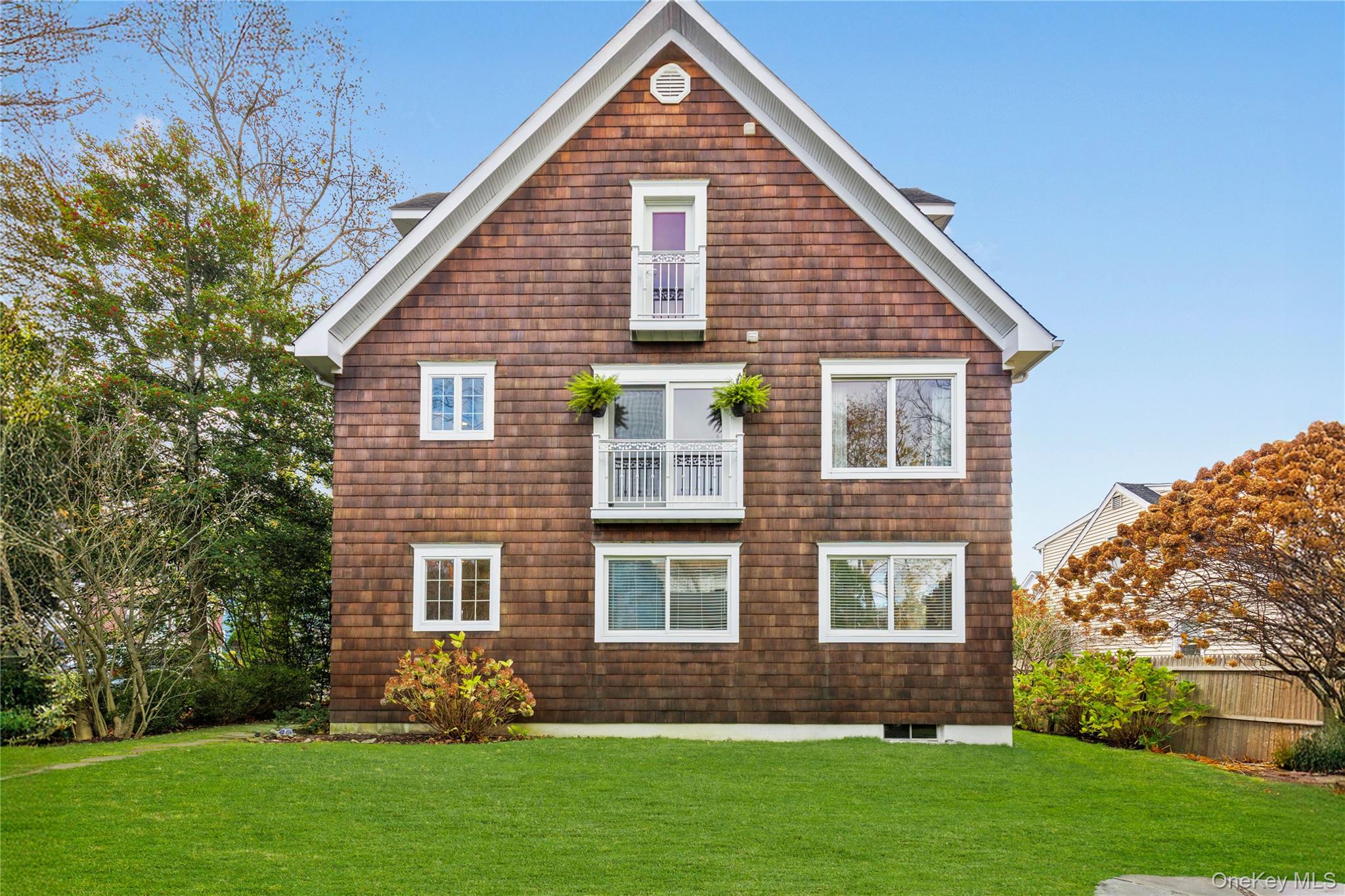 2 Goldwin Street, Unit 2 Rye, NY 10580 - Photo 23 of 28 a front view of a house with garden