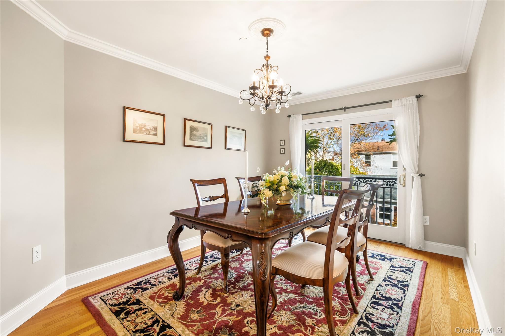 2 Goldwin Street, Unit 2 Rye, NY 10580 - Photo 6 of 28 a view of a dining room with furniture and wooden floor