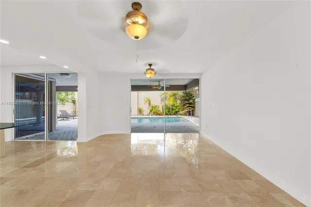 a view of a hallway with a window