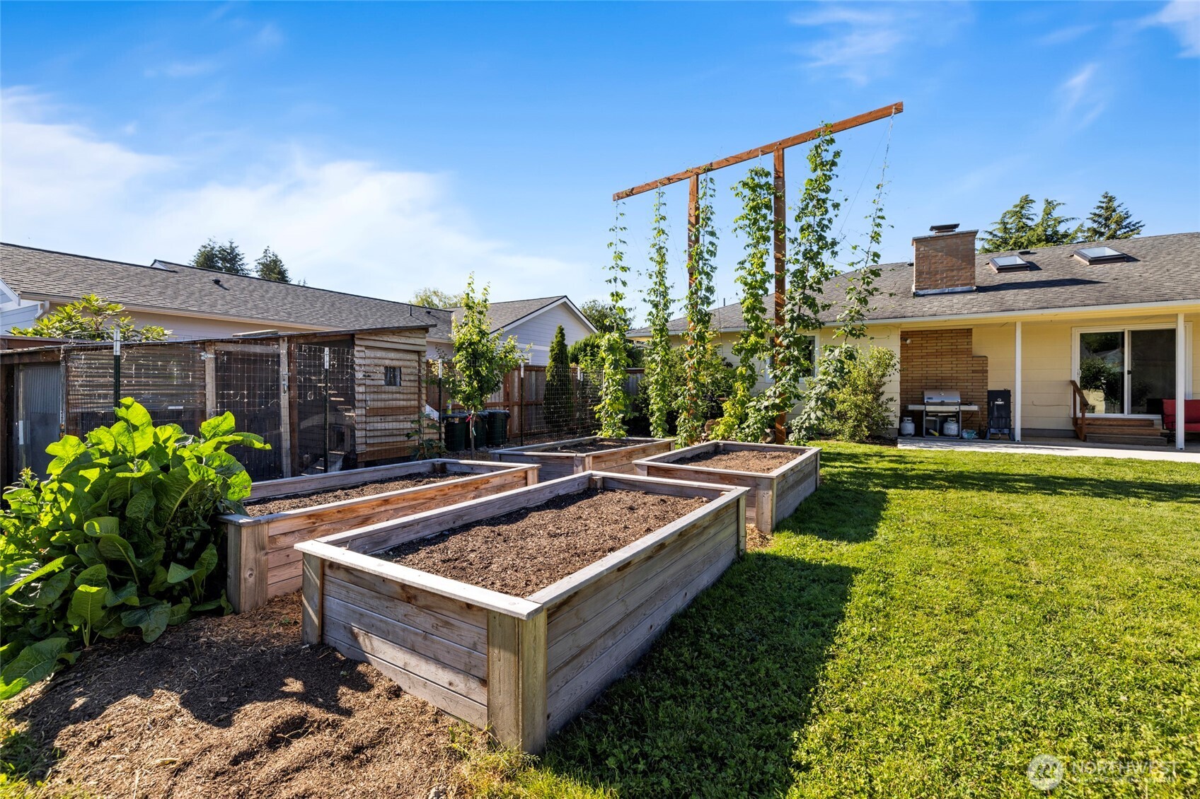 415 Sterling Street Sedro-Woolley, WA 98284 - Photo 32 of 38 a view of house with swimming pool yard and outdoor seating