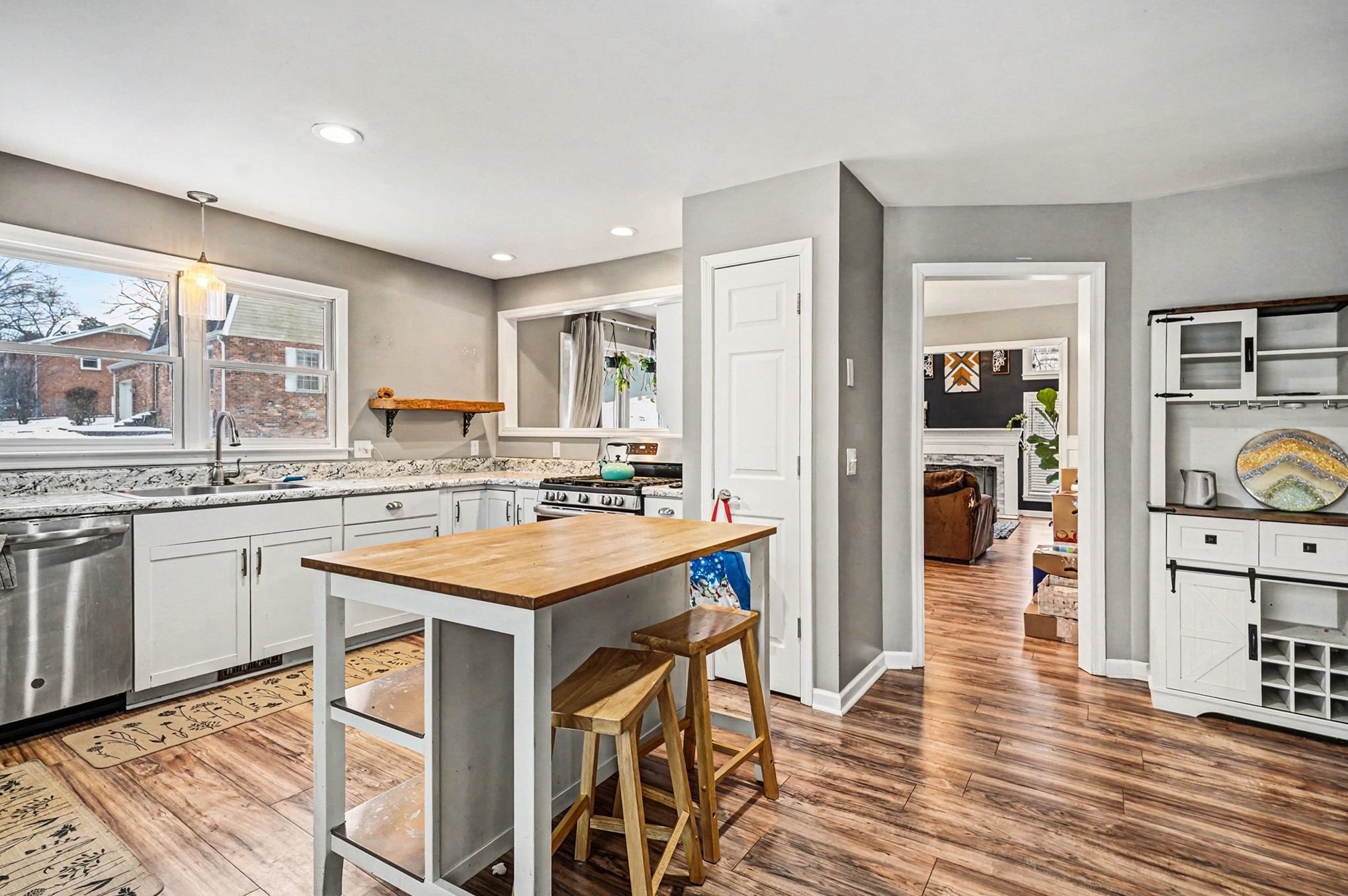 2202 Woodmont Drive Springfield, TN 37172 - Photo 15 of 50 a kitchen with granite countertop a stove a sink dishwasher and a refrigerator with wooden floor