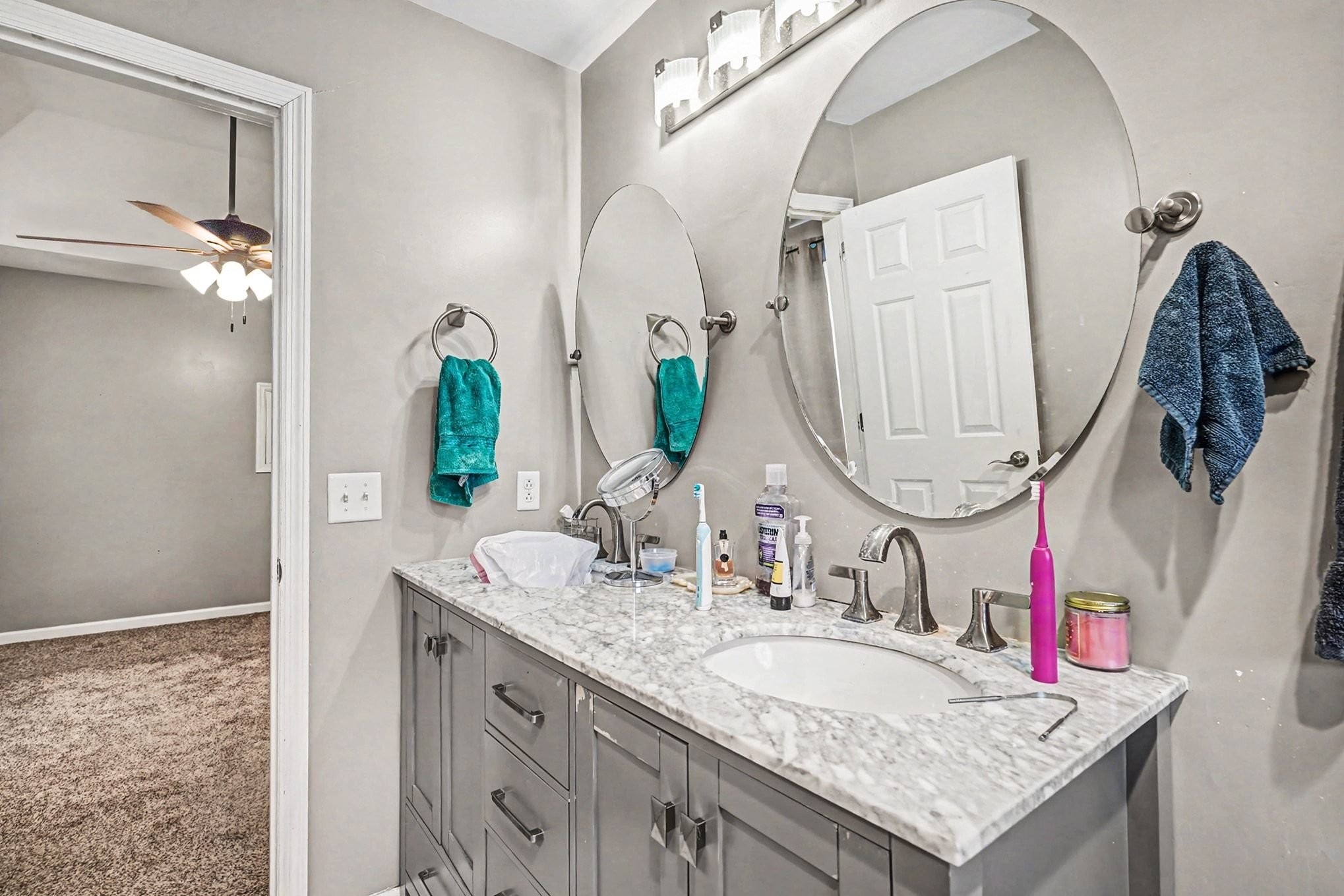 2202 Woodmont Drive Springfield, TN 37172 - Photo 29 of 50 a bathroom with a granite countertop sink and a mirror