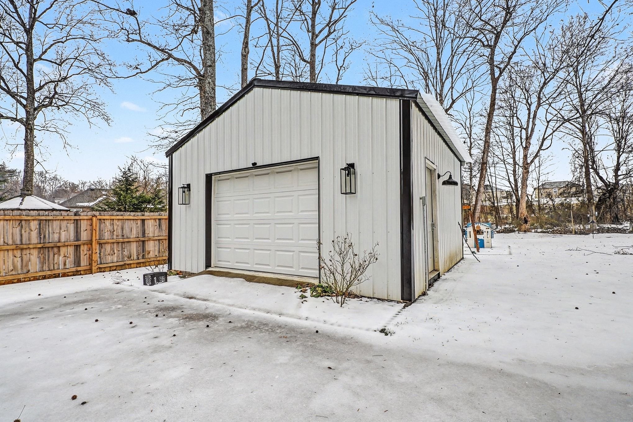 2202 Woodmont Drive Springfield, TN 37172 - Photo 40 of 50 a backyard of a house with a yard and garage
