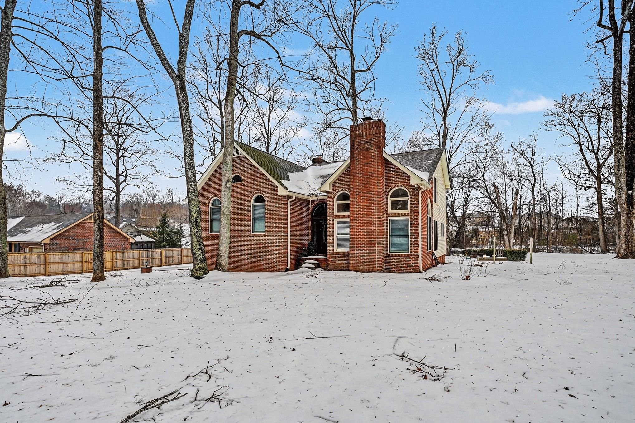 2202 Woodmont Drive Springfield, TN 37172 - Photo 4 of 50 a view of a house with snow on the road