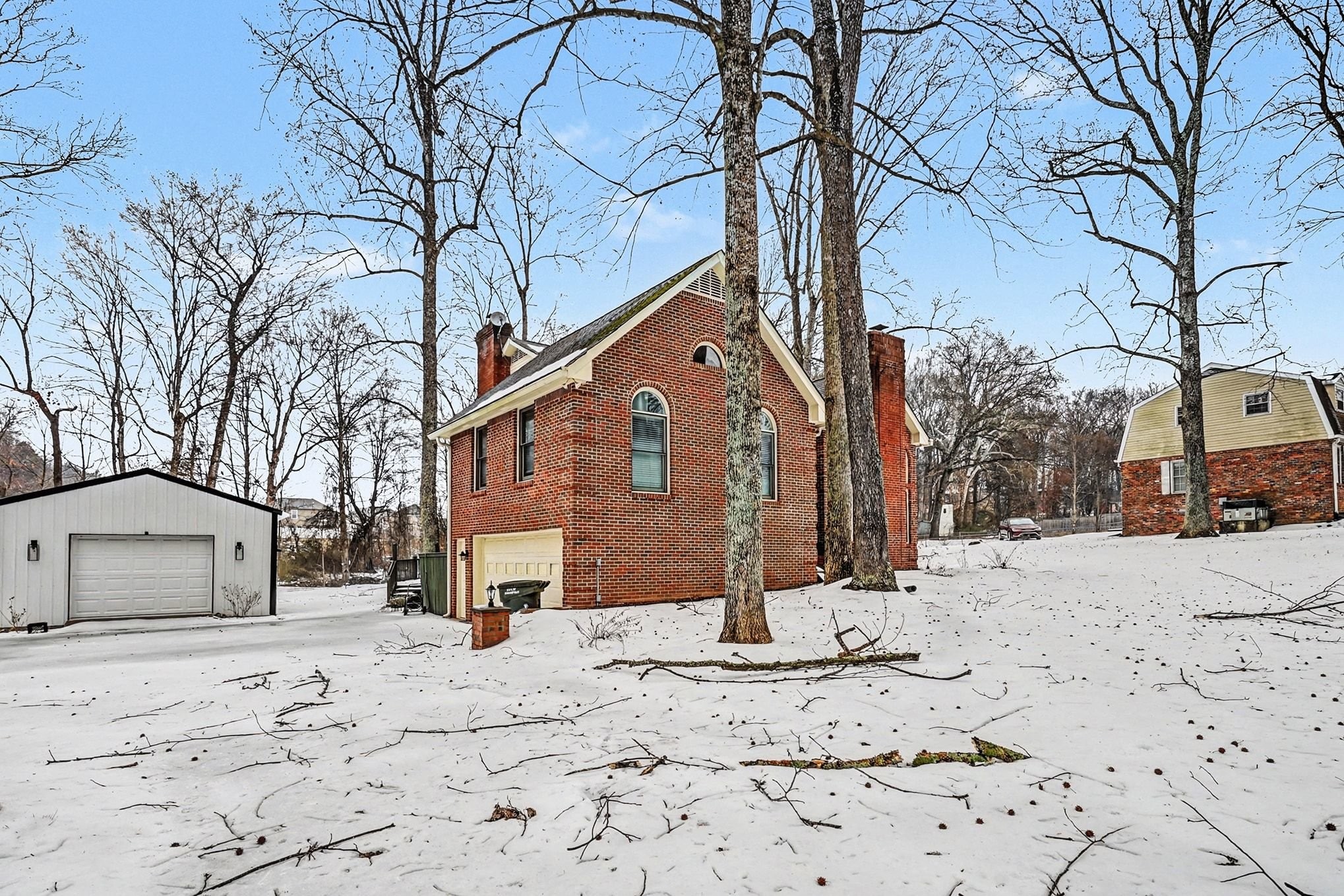 2202 Woodmont Drive Springfield, TN 37172 - Photo 50 of 50 a front view of a house with a yard covered in snow