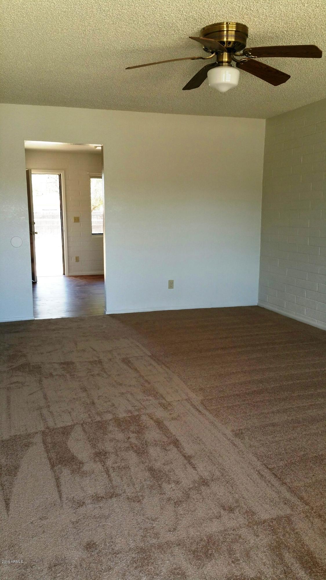 1802 West Pecan Road Phoenix, AZ 85041 - Photo 5 of 10 living room 2