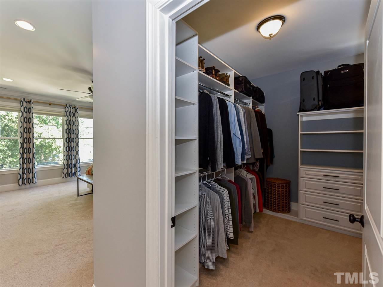703 East Franklin Street Raleigh, NC 27604 - Photo 20 of 25 HUGE walk in closet, custom designed to maximize space and organization.