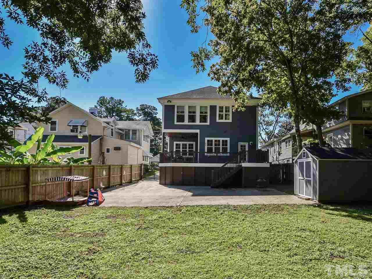 703 East Franklin Street Raleigh, NC 27604 - Photo 4 of 25 LOOK AT THE YARD! Fenced in, off st parking and plenty of room to roam!