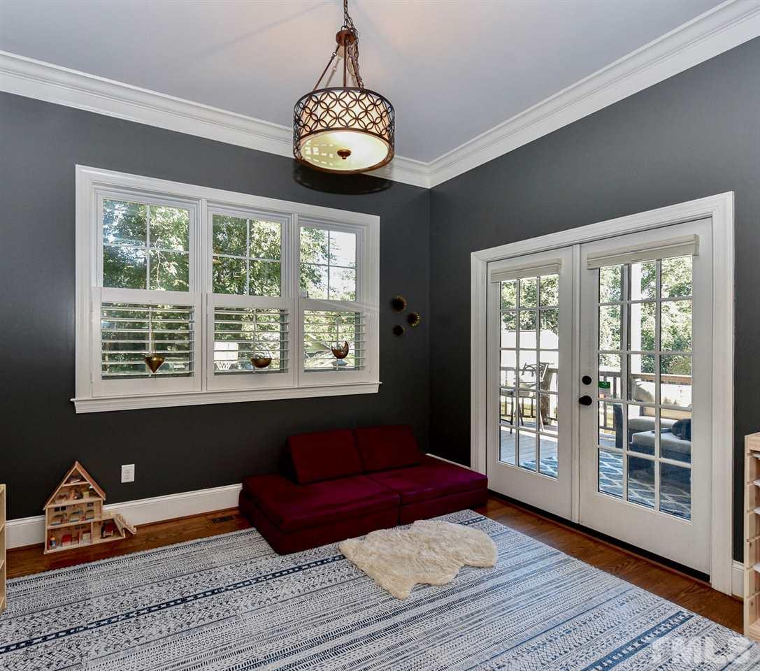 703 East Franklin Street Raleigh, NC 27604 - Photo 9 of 25 Great space for casual dinning, play area, office! Double doors open to beautiful deck/outdoor area.