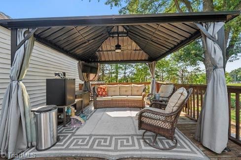 8504 Farrington Road Colfax, NC 27235 - Photo 17 of 23 Back yard comes with gazebo, TV, & furniture.