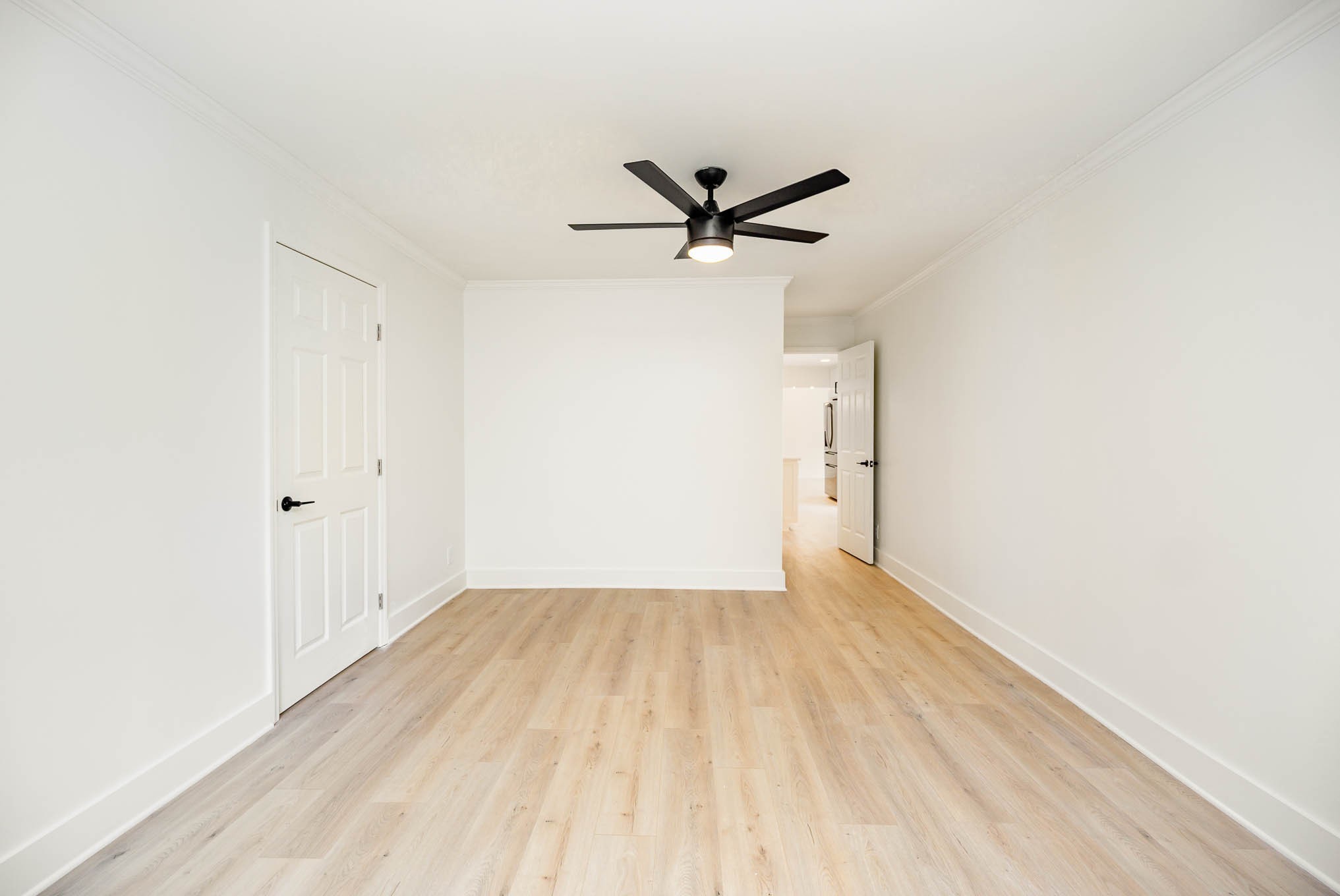 1401 Manor Road Columbia, TN 38401 - Photo 21 of 35 wooden floor in a hall with an empty room
