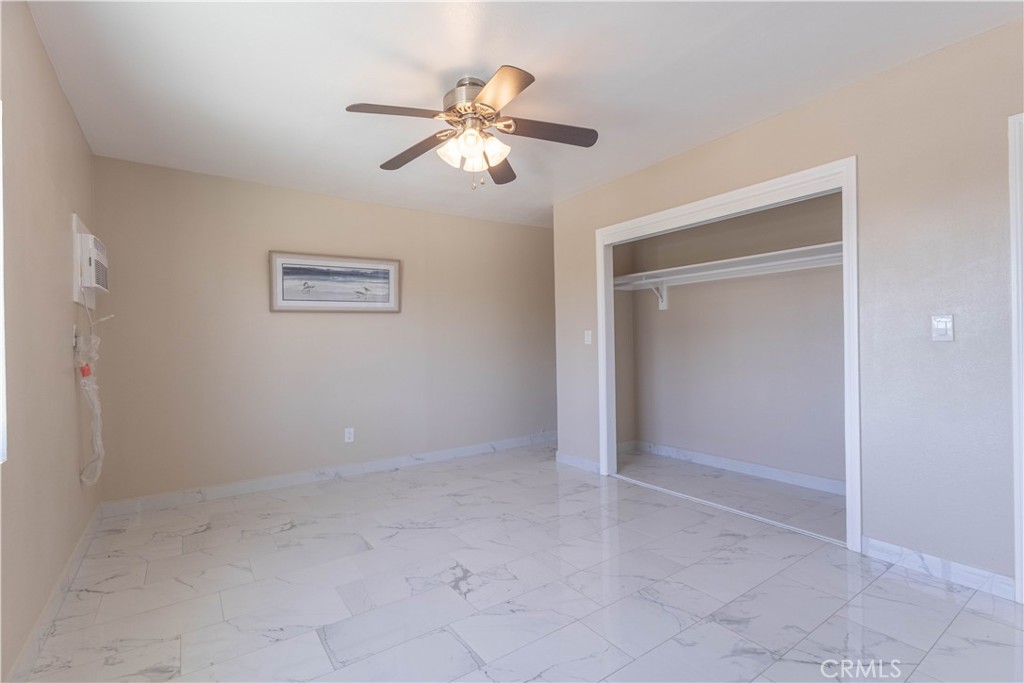 11711 Carmine Street Riverside, CA 92505 - Photo 21 of 33 wooden floor in an empty room