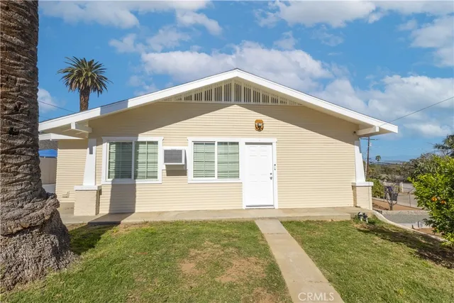 a front view of a house with a garage