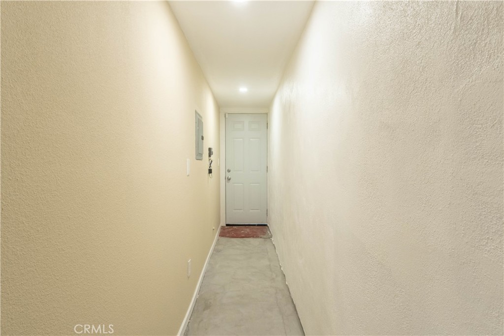11711 Carmine Street Riverside, CA 92505 - Photo 31 of 33 a view of a hallway