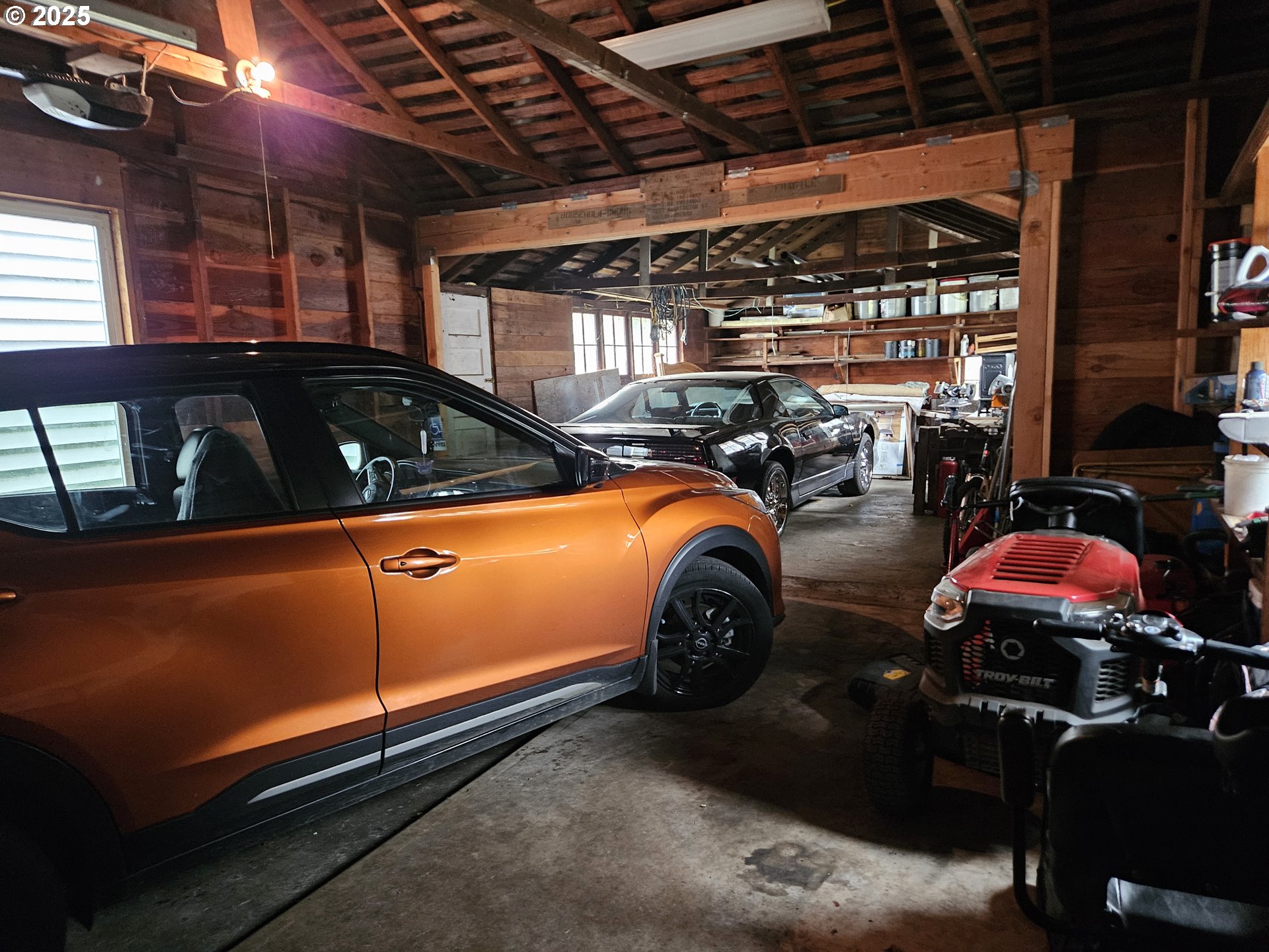 749 Southwest Washington Street Dallas, OR 97338 - Photo 11 of 14 a view of a garage with car parked